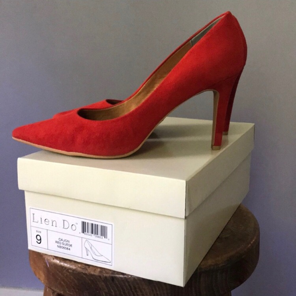 Red suede pumps